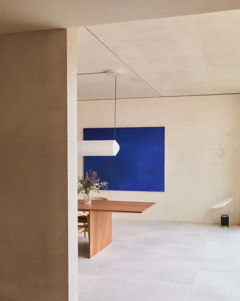 The Switch R1 installed in a warmly lit hallway.